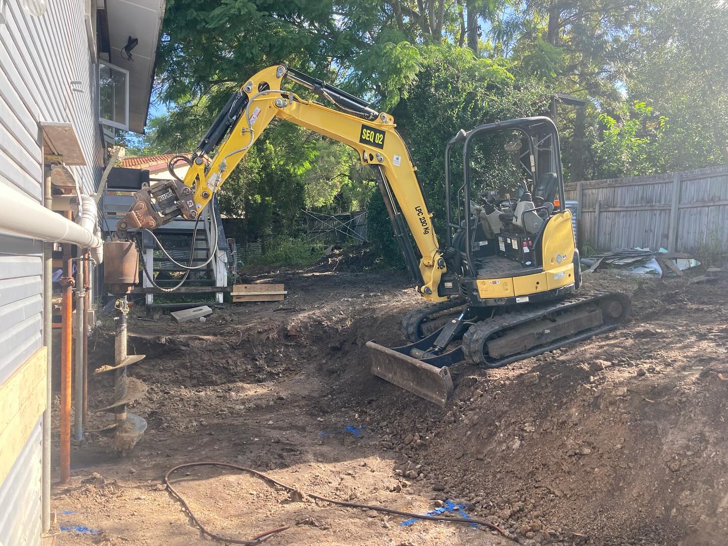 Mini excavator on residential job